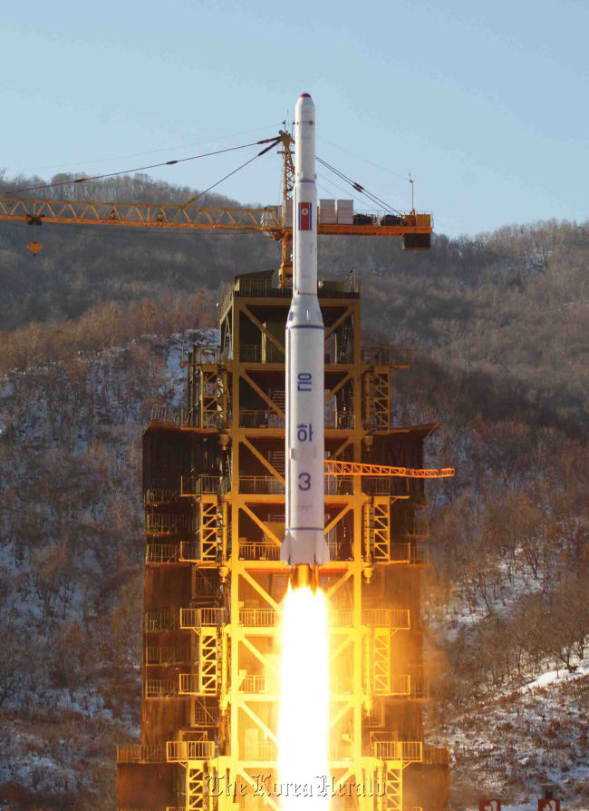 In this Dec. 12, 2012 file photo released by the North’s Korean Central News Agency, the Unha-3 rocket lifts off from the launch pad in North Korea. (AP-Yonhap News)