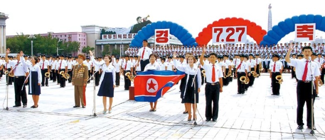 North Korean college students sing in an event to commemorate the 62nd anniversary of what North Korea claims is its victory in the 1950-53 Korean War at Kim Il-sung Plaza in Pyongyang, according to the state-run Korea Central News Agency on Monday. (Yonhap)
