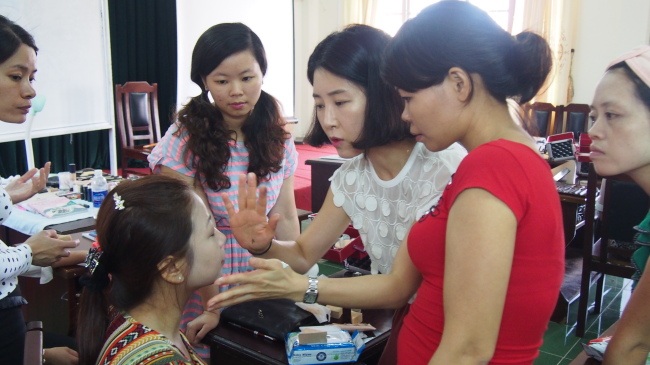 Vietnamese female job seekers learn makeup skills in a job training center run and financed by Korea’s Ministry of Gender Equality and Family. (Ministry of Gender Equality and Family). 