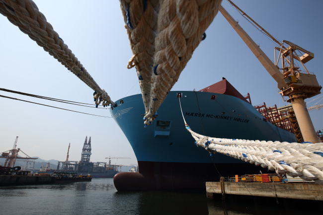 Maersk’s Triple E-class container vessel sits moored under construction at the DSME shipyard in Geoje, South Gyeongsang Province. (Bloomberg)