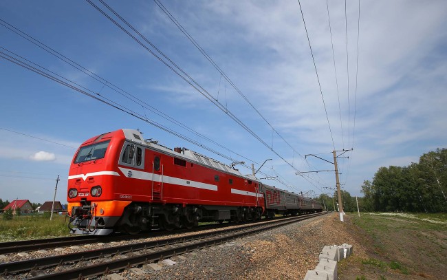 The Eurasia Express runs on the track near Novosibirsk, Russia, July 22. Yonhap
