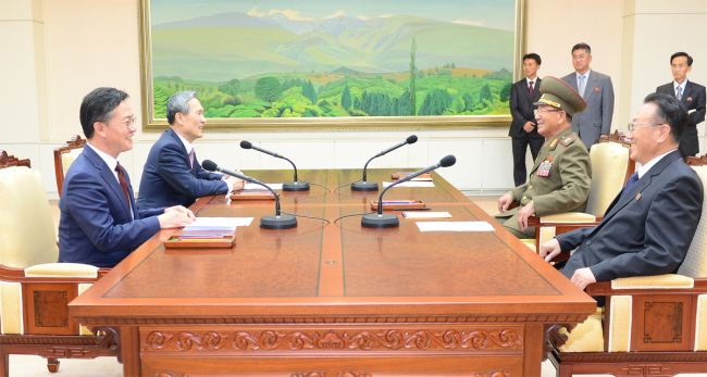 Top officials from the two Koreas engage in intense talks in South Korea’s Peace House in the inter-Korean border village of Panmunjeom this week. (Unification Ministry)