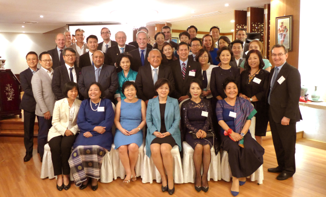 The 20th class of Korea CQ class members at Malaysian ambassador's residence on Tuesday. Joel Lee / The Korea Herald