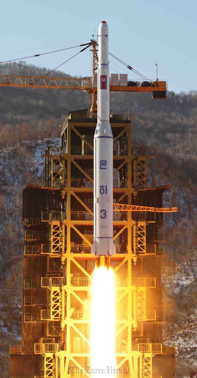 The file photo shows North Korea`s launch of a long-range rocket in 2012. (Yonhap)