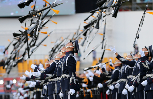 South Korea`s guards of honor perform during an opening ceremony of the Military World Games in Mungyeong, North Gyeongsang Province, Friday. (Yonhap)