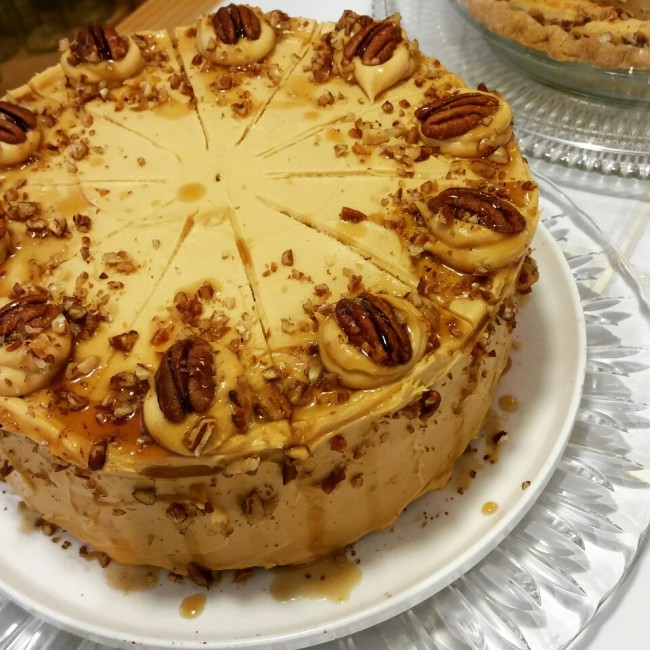 Bewitch’s pumpkin cake with caramel cream cheese frosting features layers of ginger-spiced pumpkin cake and is topped with candied maple pecans. (Bewitch)