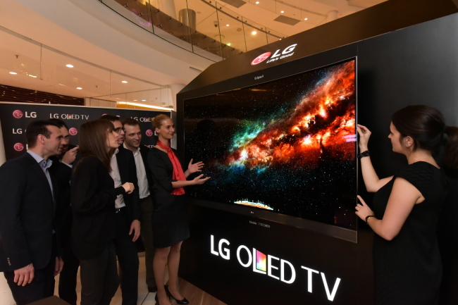 LG OLED EYES EUROPEAN MARKET -- LG Electronics said Sunday it will run the OLED TV Roadshow until Nov. 16 at Beaugrenelle, a shopping mall in Paris, where the firm will promote its organic light-emitting diode TVs. (LGE)