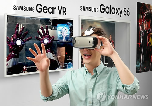 A model tries the Gear VR at a launching event. (Samsung Electronics)