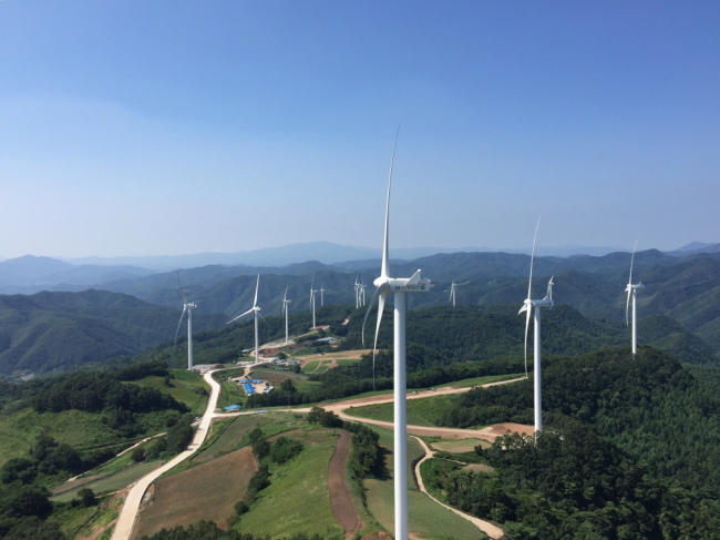 Wind turbines operate at a wind power generation site developed by LG Chem and GS E&R in Yeongyang, North Gyeongsang Province.      LG Chem