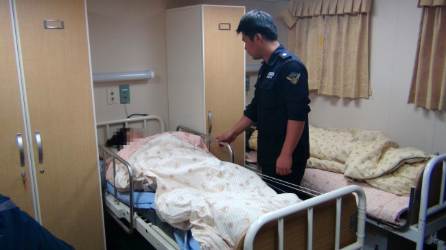 A patient is resting at a medical facility in South Korea. Yonhap