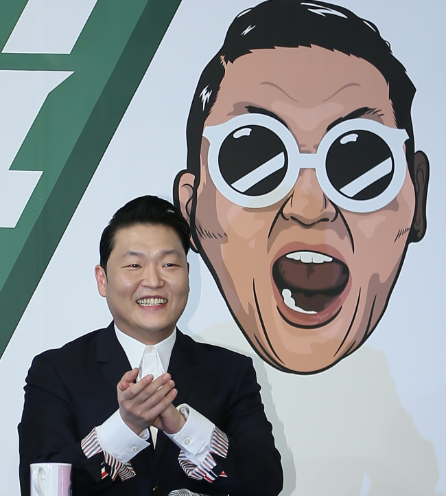 Psy speaks to press at the Conrad Hotel, Monday. (Yonhap)