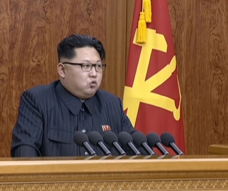 North Korean leader Kim Jong-un delivers his New Year`s message live on the North`s television on Friday. (Yonhap)