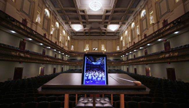 An iPad with a Boston Symphony Orchestra interactive program is displayed on the conductor‘s stand at Symphony Hall in Boston last Friday. (AP-Yonhap)