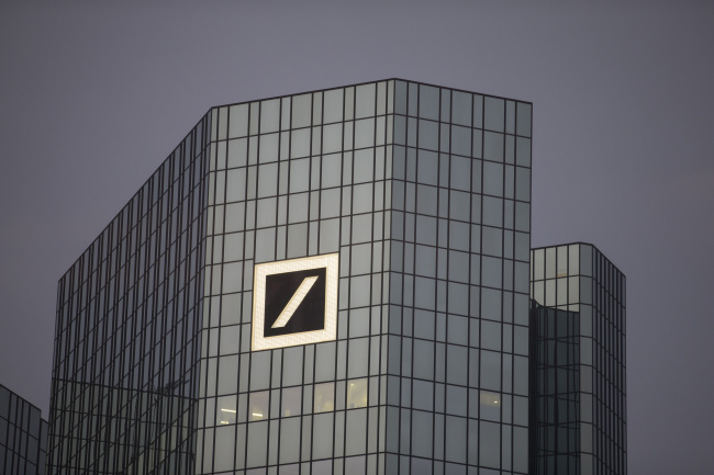 The company logo sits on the skyscraper headquarter offices of Deutsche Bank AG in Frankfurt, Germany. (Bloomberg)