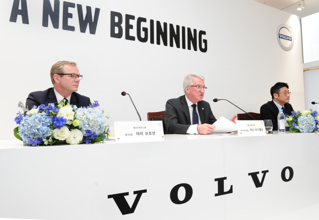 Lars Danielson, senior vice president of Volvo Cars Asia-Pacific Region (center), Jari Kohonen, senior vice president of Volvo Cars Asia-Pacific Region (left) and Volvo Korea CEO Lee Yun-mo hold a press conference at a showroom in Ilsan, Gyeonggi Province, Friday.  (Volvo Korea)