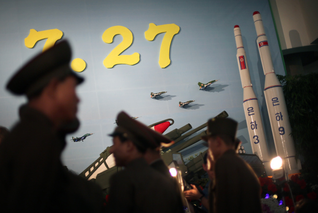 Models of North Korea’s Unha-9 and Unha-3 rockets are displayed at an exhibition hall in Pyongyang in this photo dated July 26, 2013. Yonhap