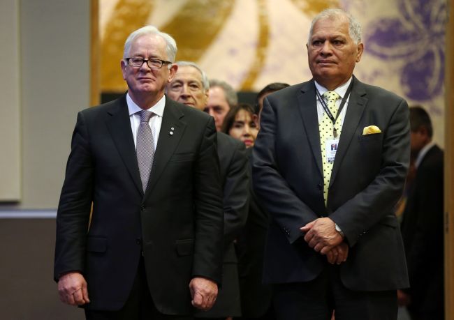 Andrew Robb, Minister for Trade and Investment (L) is welcomed with a local Maori elder as the Ministerial Representatives from the 12 countries arrive for the signing of the Trans-Pacific Partnership(TPP) agreement in Auckland on February 3, 2016. The ambitious pact -- agreed in October 2015 after marathon negotiations in Atlanta, Georgia -- aims to break down trade and investment barriers between countries comprising about 40 percent of the global economy. (AFP)