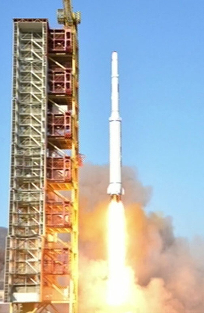 The North’s Korean Central News Agency released a photo showing the launch of Gwangmeyonseong-4 on Sunday. (Yonhap)