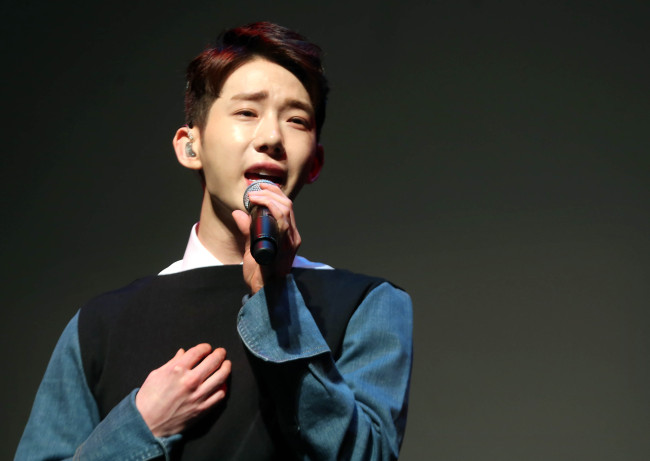 Jo Kwon performs at a media event in Seoul on Monday. (Yonhap)