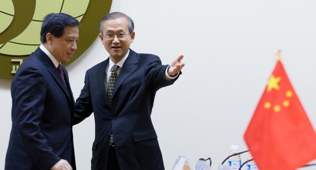 China’s Vice Foreign Minister Zhang Yesui is greeted by South Korean Vice Foreign Minister Lim Sung-nam before their annual Strategic Dialogue in Seoul on Feb. 16. (Yonhap)