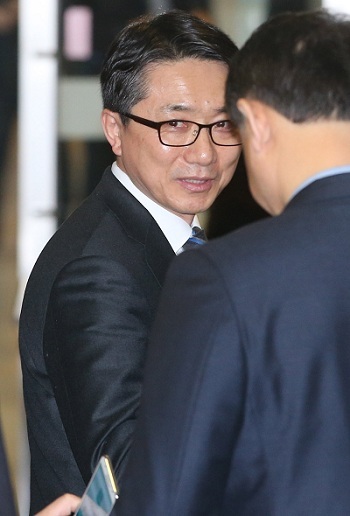 CJ HelloVision CEO Kim Jin-seok responds to reporters after a shareholders meeting in Seoul on Friday. Yonhap