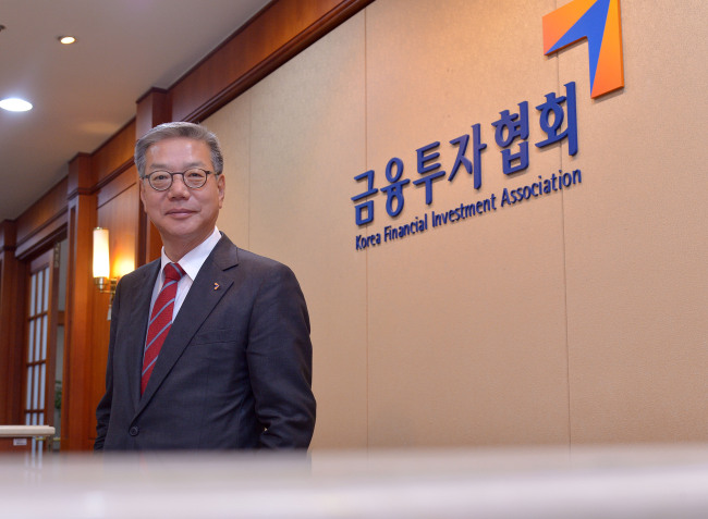 Hwang Young-key, chairman of the Korea Financial Investment Association, poses before an interview with The Korea Herald in Seoul on Wednesday. Lee Sang-sub/The Korea Herald