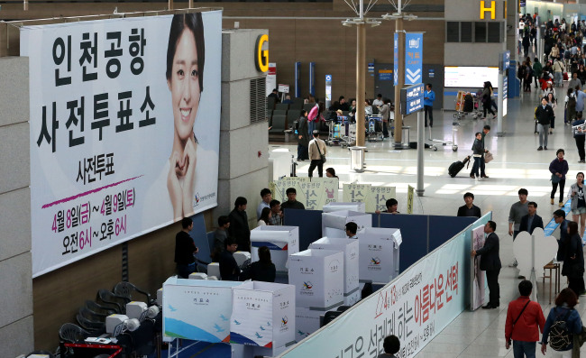 Polling booths are set up at Incheon International Airport ahead of the preliminary voting for the 20th National Assembly on Thursday. (Yonhap)