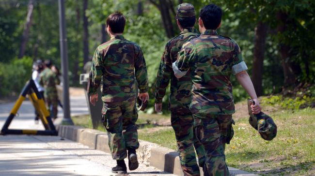 Reservists head for their training. The Korea Herald