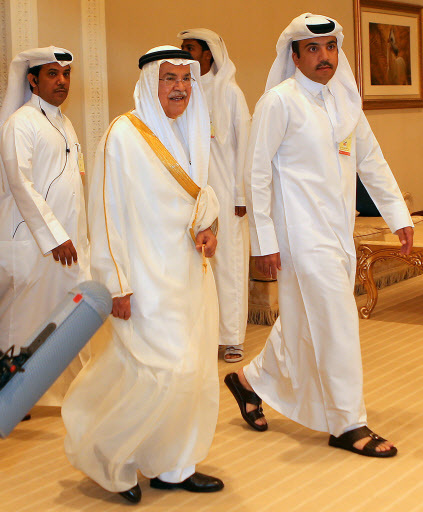 Saudi Arabia's minister of Oil and Mineral Resources Ali al-Naimi (C) arrives for the organization of Petroleum Exporting Countries (OPEC) meeting, in the Qatari capital Doha, on April 17, 2016. Top energy officials from some 15 countries including Saudi Arabia and Russia are at the Doha talks, amid reports a draft agreement was in the works to freeze output at January levels until at least October. (AFP)