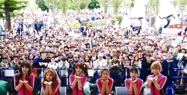 K-pop girl group AOA poses at an event promoting their new Japanese album in Japan. (FNC Entertainment)