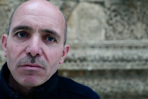 Mohamed Al-Subeeh, who used to work in the Mosaics Museum at Maaret Al-Numan in Idlib province and is now a guide at Berlin’s Bode Museum, poses for a photo at a ceremony during which funding was made available to continue the Multaka project, at the Museum for Islamic Art in Berlin on April 28. (AFP-Yonhap)