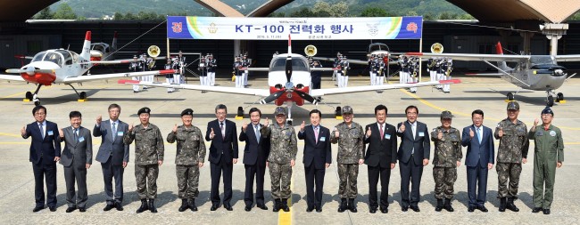 KOREA’S 1ST HOMEGROWN TRAINER JET -- President and CEO of Korea Aerospace Industries Ha Sung-yong (seventh from left), South Korea’s Air Force Chief of Staff Jeong Kyeong-doo (center) and other high-level military and government officials partake in an event Wednesday at the Korea Air Force Academy in Cheongju, North Chungcheong Province, to celebrate the fielding of the KT-100, the country’s first indigenous trainer jet developed by KAI. The same day, the South Korean Air Force commenced its deployment of KT-100 trainer jets for its introductory pilot training course. (KAI)