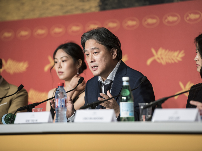 Director Park Chan-wook speaks to reporters after a press screening of “The Handmaiden” at the 69th Cannes Film Festival on Saturday. (CJ Entertainment)