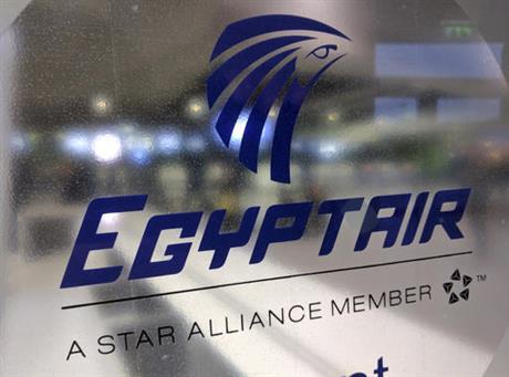 A frosted glass partition is seen at the EgyptAir counter at Charles de Gaulle Airport outside Paris, France, Thursday, May 19, 2016. EgyptAir said a flight from Paris to Cairo disappeared from radar early Thursday morning. (AP)