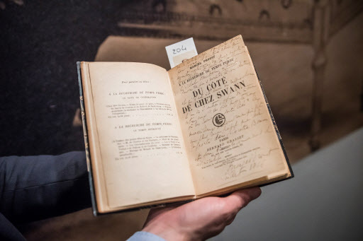 A view of an original copy of “Swann’s Way,” signed by French author Marcel Proust (1871-1922), is shown at an auction house in Paris, France on Monday. (EPA-Yonhap)