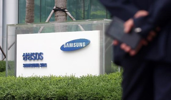 A man passes by Samsung SDS’ head office in Seoul. (Yonhap)
