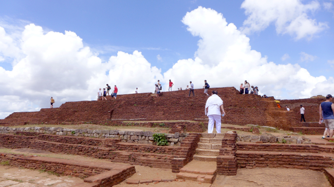 The Rock Fortress of Sigiriya, dubbed the “eighth wonder of the world,” was a royal citadel in the fifth century with a pleasure garden built atop a 200-meter-rock, overlooking a verdant field. (Joel Lee / The Korea Herald)