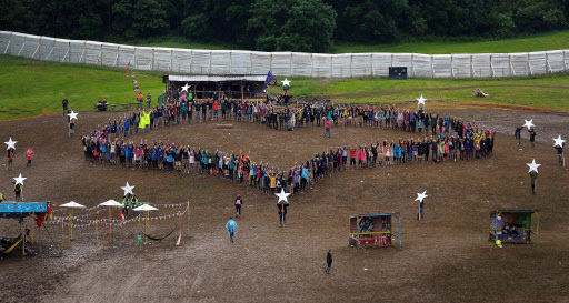 A flash mob forms a heart with stars around the edges to represent the EU as a statement on the Brexit vote on day five of the Glastonbury Festival of Music and Performing Arts on Worthy Farm near the village of Pilton in Somerset, south west England, on June 26. (AFP)