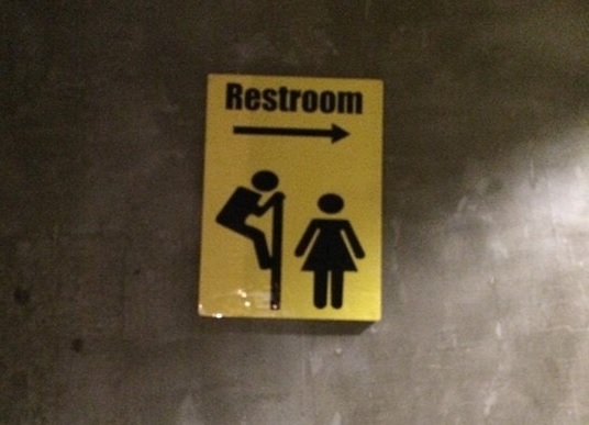 Voyeuristic public bathroom signs in restaurants in Seoul. (Credit: Lee Da-kyung)