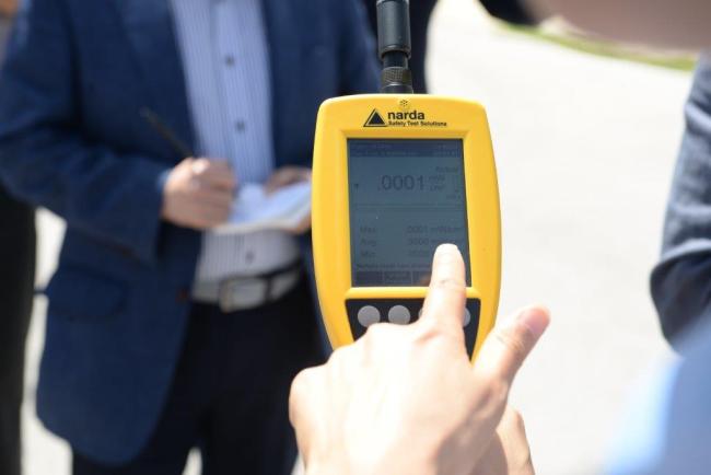 An electromagnetic radiation measuring device shows the level of 0.0001 watts per square meter during a press tour to the Anderson Air Force Base in Guam on Monday. (The U.S. Air Force's 36th Wing)