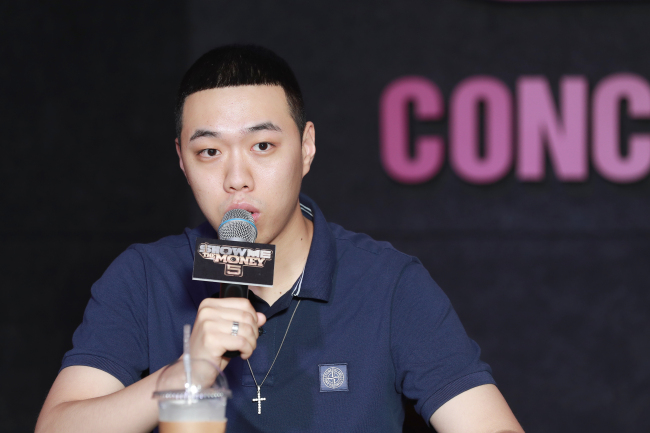 Rapper BewhY speaks to reporters in southern Seoul on Tuesday. (CJ E&M)