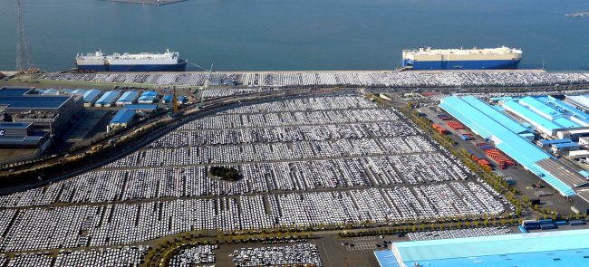 Hyundai, Kia cars wait to be shipped at a port in Ulsan.