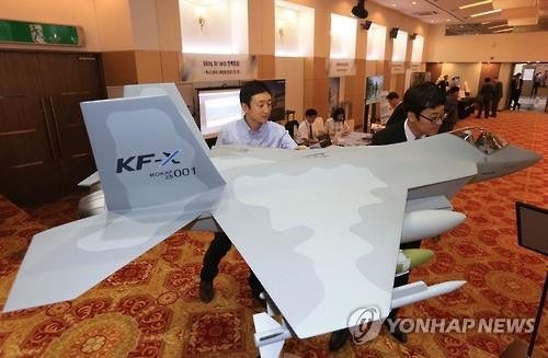 In this photo taken on June 14, a model KF-X fighter jet is displayed in a workshop of military officials and experts in Seoul. (Yonhap)