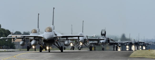 South Korean fighter jets are seen on the runway of the Cheongju International Airport during the Soaring Eagle aerial exercise Monday. / Air Force