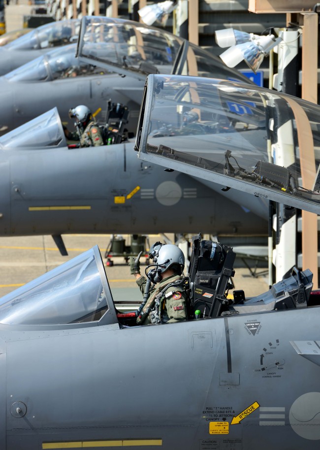 South Korean pilots prepare for takeoff at the runway of the Cheongju International Airport during the Soaring Eagle aerial exercise on Monday. / Air Force