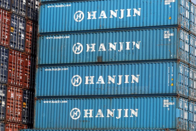 Freight containers carrying the logo of Hanjin Shipping are stacked at Busan Port on Thursday. (Yonhap)