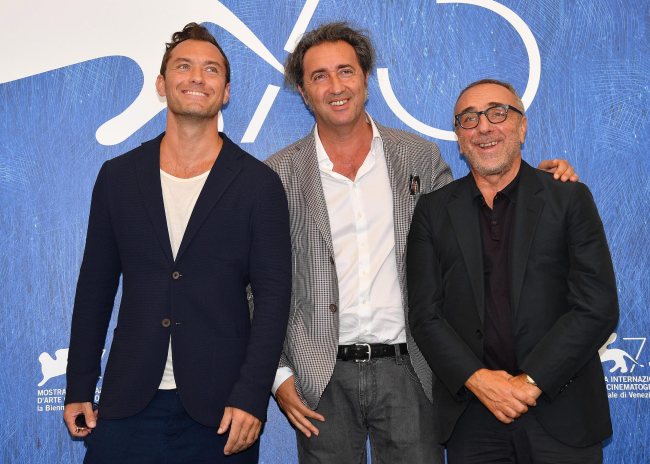 From left: British actor Jude Law, Italian director Paolo Sorrentino and Italian actor Silvio Orlando pose during a photocall for 