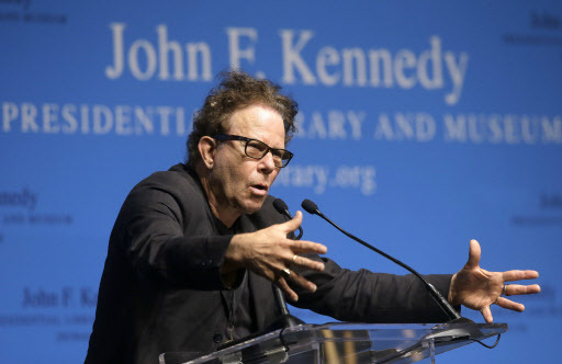 Musician Tom Waits addresses an audience after he and musician Kathleen Brennan, his wife, were presented with the PEN New England’s Song Lyrics of Literary Excellence Award during a ceremony at the John F. Kennedy Library and Museum, Boston, Monday. (AP)