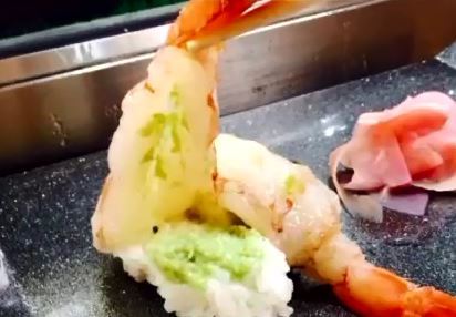 A picture posted on social media, showing twice the normal amount of wasabi to the Korean tourists' sushi orders. 