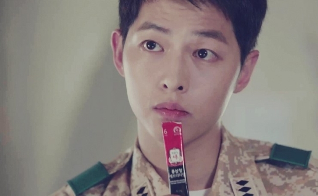 Actor Song Jung-ki is seen drinking CKJ Everytime in a still from the KBS hit drama series “Descendants of the Sun.”